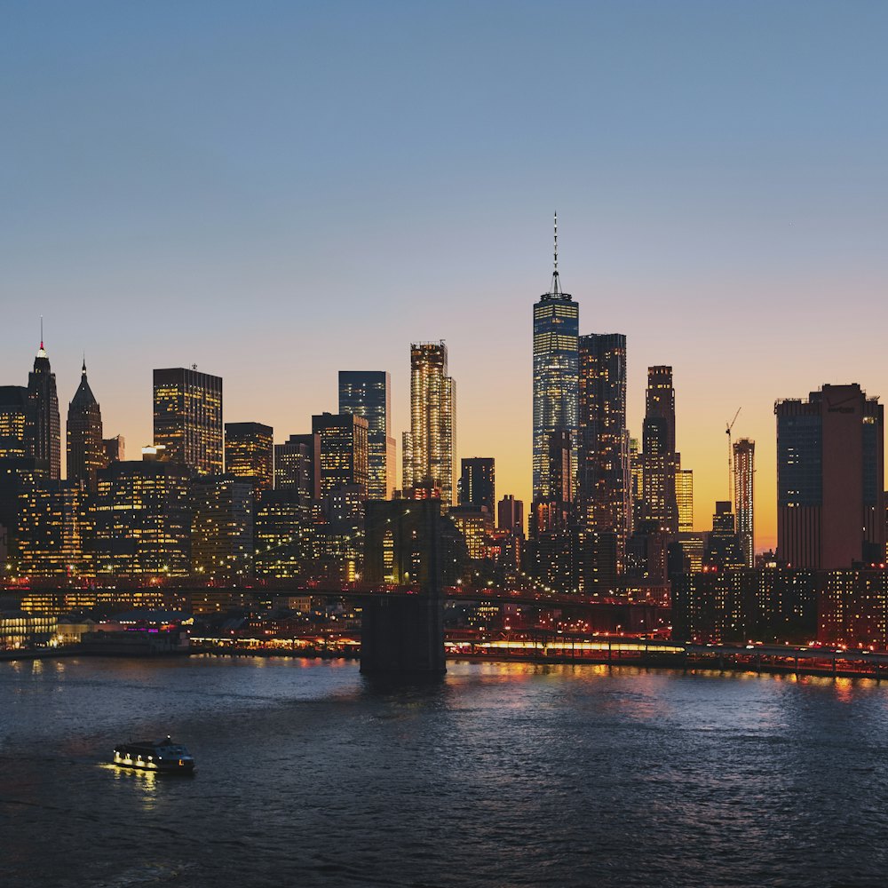 A suspension bridge against a dense skyline.