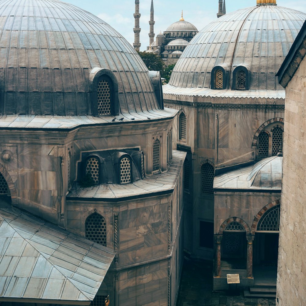 Lead domes and minarets above a strait.